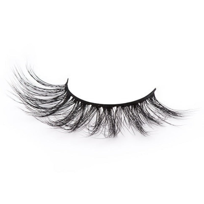 On a white background, beautiful black eye lashes called Faith Faux Mink Lashes in a round shape. 20mm length. Material : Mink. Fluffy Silk Effect.