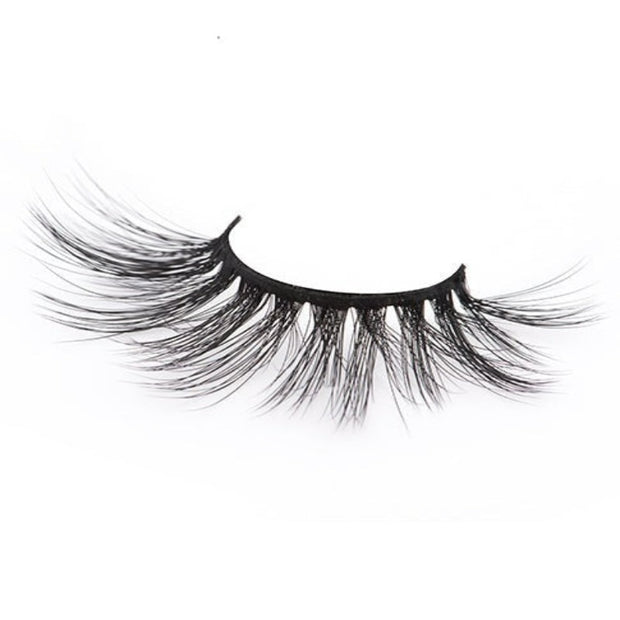 On a white background, beautiful black eye lashes called Miami Faux Mink Lashes in a round shape. 20mm length. natural volume. Material : 3D Mink- Soft and Fluffy Silk