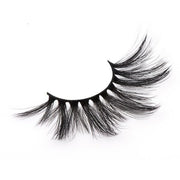 On a white background, beautiful black eye lashes called Queen 3D Faux Mink Lashes. 20mm length. Style: Double and triple layered.