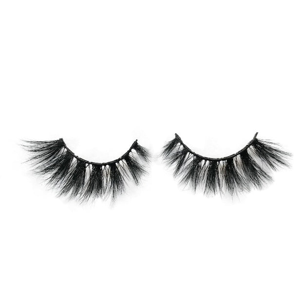 On a white background, beautiful two black eye lashes called Brooklyn 3D Mink Lashes in a round shape. 18mm length. medium volume. Material : Mink. Full-body, Wispy Effect.
