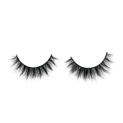 On a white background, a beautiful two black eye lashes called Kim Mink Lashes in a flare shape. 10mm length. medium volume.