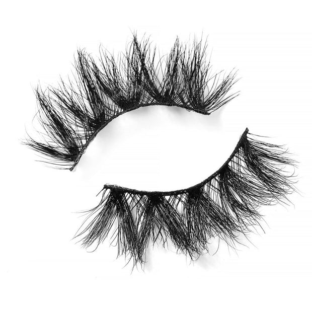 On a white background, beautiful two black eye lashes called Diamond Mink Lashes in a flare shape. maximum volume. Material : Mink. Full-body, Bold, Fluttery Effect.