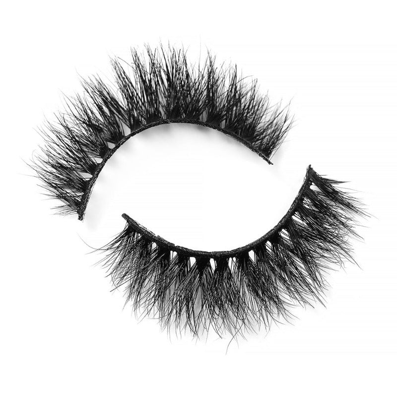 On a white background, a beautiful two black eye lashes called Everlasting 3D Mink Lashes in a round shape. 15mm length. short volume. wispy effect.